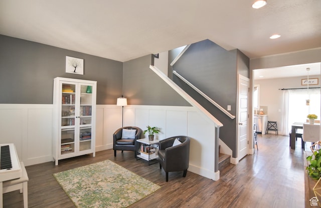 3319 N Falcon Way, Layton, UT 84040 - living area with stairway, wood finished floors, recessed lighting, a wainscoted wall, and a decorative wall