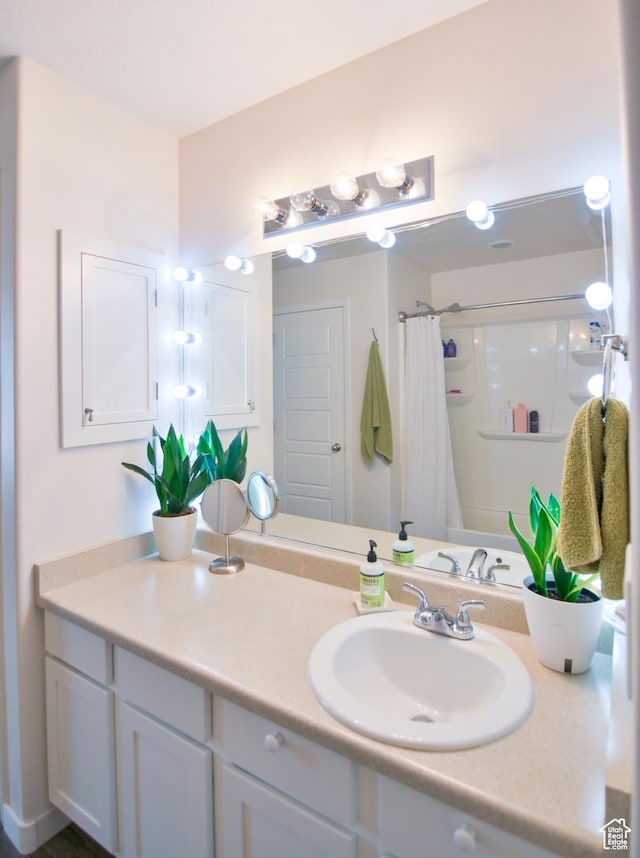 3319 N Falcon Way, Layton, UT 84040 - full bathroom featuring vanity and a shower with shower curtain