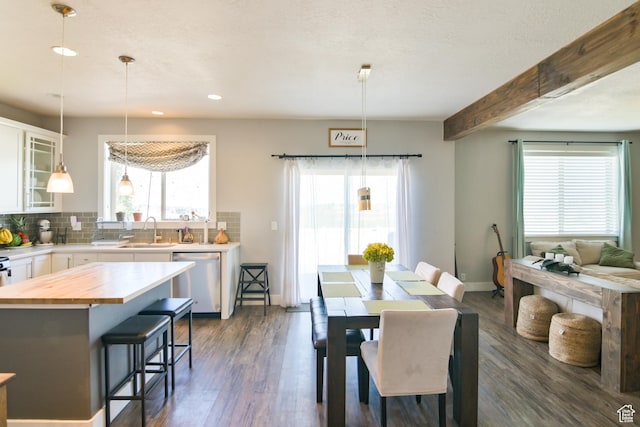 3319 N Falcon Way, Layton, UT 84040 - dining room with dark wood-style flooring, recessed lighting, and beam ceiling