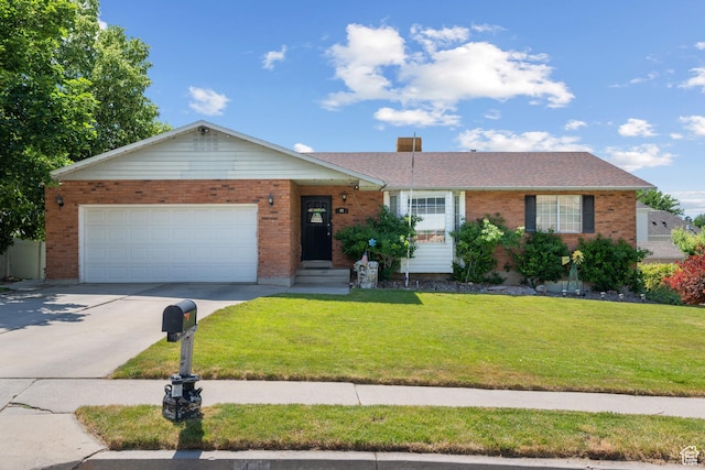 44 S 1000 E, Springville, UT 84663 - ranch-style house featuring brick siding, concrete driveway, a front yard, and an attached garage