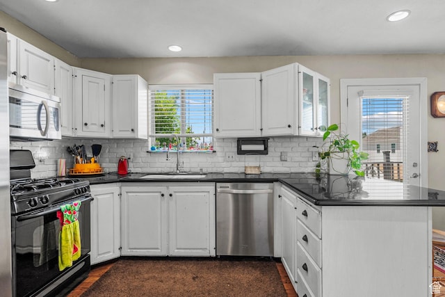 44 S 1000 E, Springville, UT 84663 - kitchen with appliances with stainless steel finishes, dark countertops, white cabinets, and recessed lighting