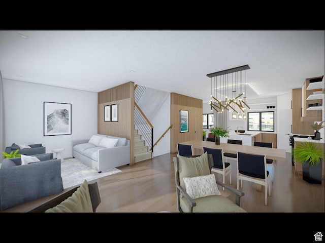 0, Garden City, UT 84028 - dining space featuring stairway, a chandelier, and light wood-style floors