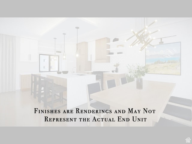 0, Garden City, UT 84028 - dining area featuring a chandelier