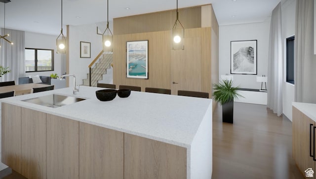 0, Garden City, UT 84028 - kitchen featuring modern cabinets, light brown cabinetry, light wood-style flooring, an island with sink, and light stone counters