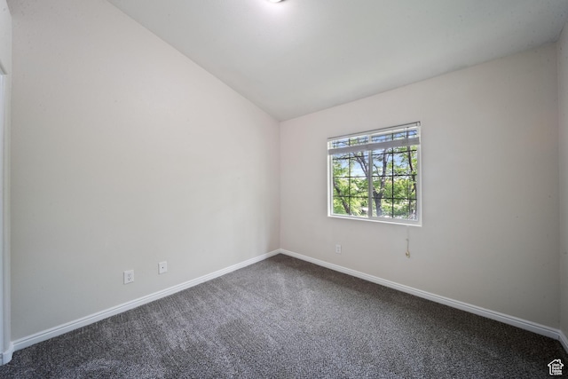 3807 S River Run Way Unit 3, Salt Lake City, UT 84119 - spare room featuring dark carpet and lofted ceiling