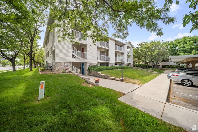 3807 S River Run Way Unit 3, Salt Lake City, UT 84119 - view of property featuring uncovered parking