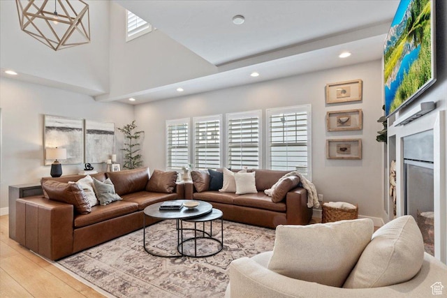 5057 W Bowstring Way S, South Jordan, UT 84009 - living area featuring light wood finished floors, recessed lighting, and a fireplace