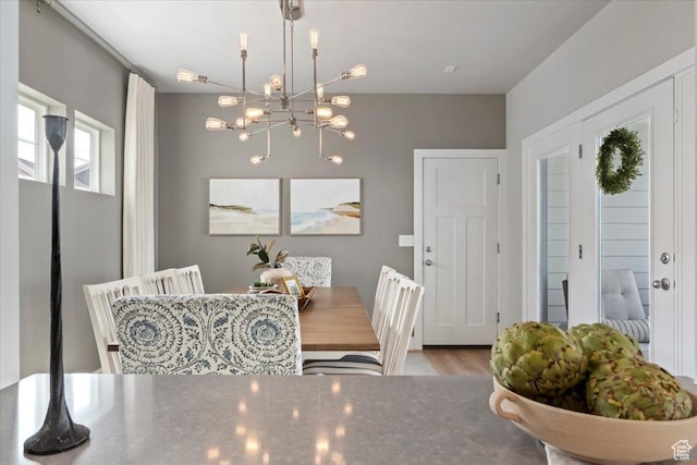 5057 W Bowstring Way S, South Jordan, UT 84009 - dining room featuring a chandelier and wood finished floors