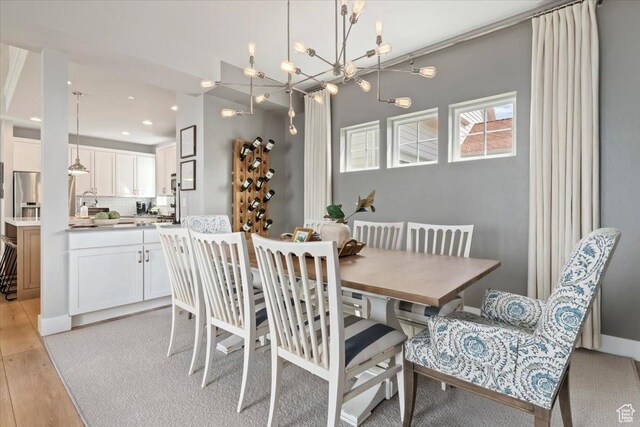 5057 W Bowstring Way S, South Jordan, UT 84009 - dining area featuring light wood-style flooring, recessed lighting, and a chandelier