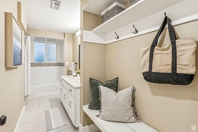 8816 S Alpen Way E, Cottonwood Heights, UT 84121 - mudroom featuring baseboards and light tile patterned floors