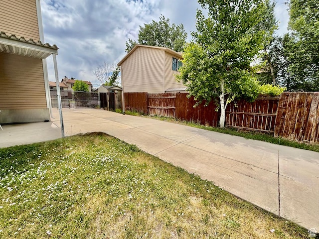 4946 W Pawnee Dr, West Jordan, UT 84081 - view of yard featuring a patio area