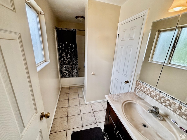 4946 W Pawnee Dr, West Jordan, UT 84081 - full bath with vanity, shower / bath combination with curtain, decorative backsplash, and tile patterned flooring
