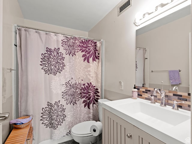 123 E 2nd Ave Unit 502, Salt Lake City, UT 84103 - bathroom featuring vanity, backsplash, and a shower with shower curtain