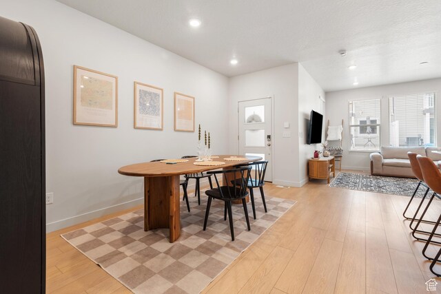 938 W Terracotta Dr, Saratoga Springs, UT 84045 - dining space featuring light wood-style flooring and recessed lighting