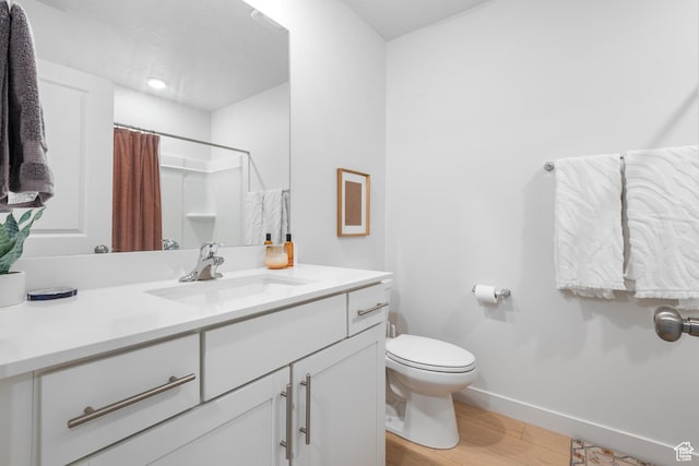 938 W Terracotta Dr, Saratoga Springs, UT 84045 - full bathroom with vanity, wood finished floors, and a shower with curtain