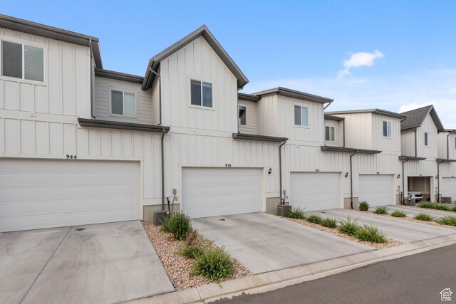 938 W Terracotta Dr, Saratoga Springs, UT 84045 - view of property with an attached garage, board and batten siding, and concrete driveway