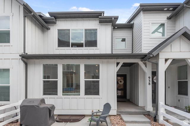 938 W Terracotta Dr, Saratoga Springs, UT 84045 - doorway to property featuring board and batten siding