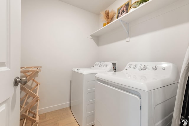 938 W Terracotta Dr, Saratoga Springs, UT 84045 - laundry room with separate washer and dryer and light wood-type flooring