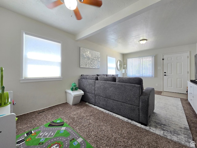 4321 W 5655 S, Salt Lake City, UT 84118 - carpeted living room with plenty of natural light, ceiling fan, and beamed ceiling