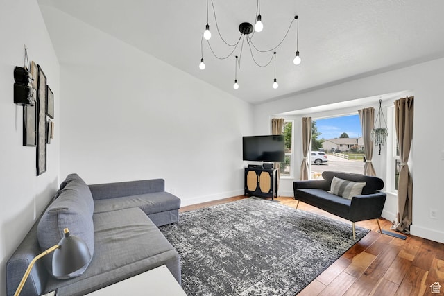 874 W 1145 N, Clinton, UT 84015 - living area with wood finished floors, a chandelier, and lofted ceiling