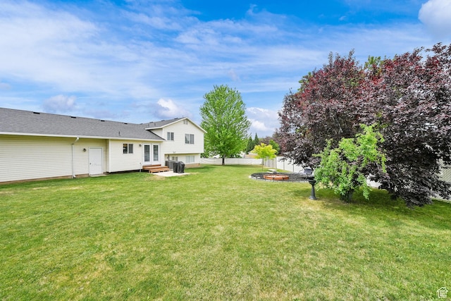 874 W 1145 N, Clinton, UT 84015 - view of yard featuring an outdoor fire pit, french doors, and entry steps
