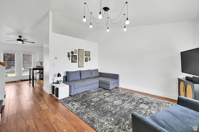 874 W 1145 N, Clinton, UT 84015 - living room featuring wood finished floors, a chandelier, a ceiling fan, and vaulted ceiling