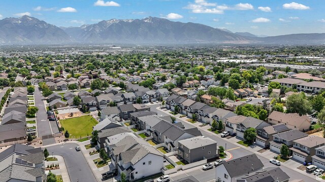 1666 W Rockaway Ln, West Jordan, UT 84084 - aerial perspective of suburban area with mountains