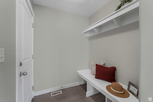 1666 W Rockaway Ln, West Jordan, UT 84084 - mudroom featuring dark wood-style flooring and baseboards