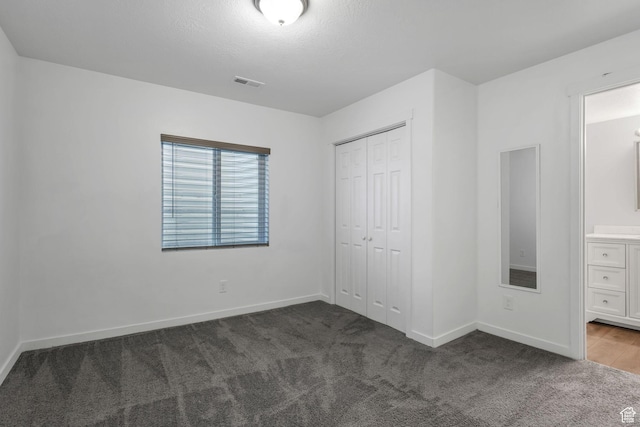 1666 W Rockaway Ln, West Jordan, UT 84084 - unfurnished bedroom with carpet floors, a closet, and ensuite bathroom