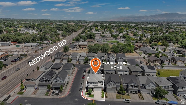 1666 W Rockaway Ln, West Jordan, UT 84084 - aerial perspective of suburban area featuring a mountain backdrop