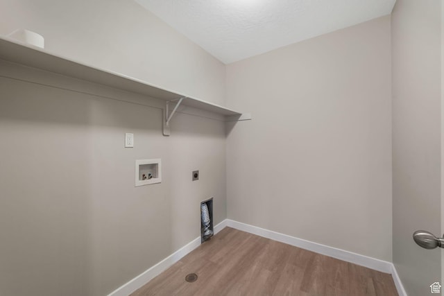 1666 W Rockaway Ln, West Jordan, UT 84084 - washroom with washer hookup, light wood-type flooring, and electric dryer hookup