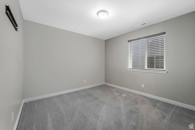 1666 W Rockaway Ln, West Jordan, UT 84084 - carpeted spare room featuring baseboards