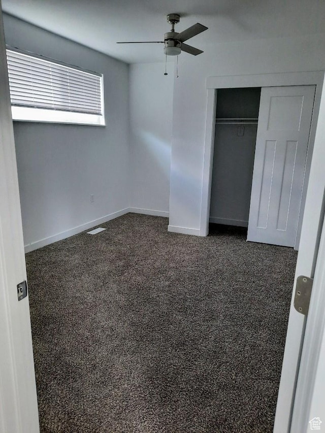 1018 E 40 N, Springville, UT 84663 - unfurnished bedroom featuring a closet, carpet flooring, and ceiling fan