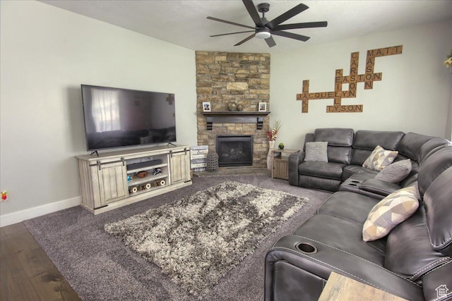 342 E Chiswick Ct, Stansbury Park, UT 84074 - living area with ceiling fan, a fireplace, and wood finished floors