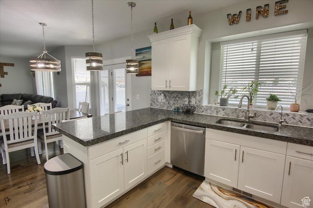 342 E Chiswick Ct, Stansbury Park, UT 84074 - kitchen featuring dishwasher, backsplash, white cabinetry, and dark wood-type flooring