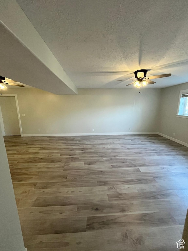 345 E 350 N, Salem, UT 84653 - empty room with a ceiling fan, a textured ceiling, and wood finished floors