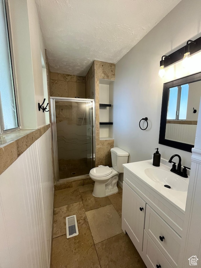345 E 350 N, Salem, UT 84653 - bathroom featuring a shower stall, vanity, and a textured ceiling