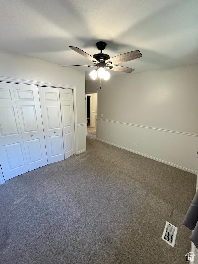 345 E 350 N, Salem, UT 84653 - unfurnished bedroom featuring carpet floors, a closet, a ceiling fan, and a wainscoted wall