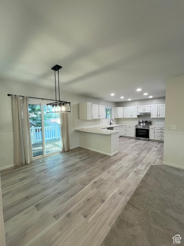 345 E 350 N, Salem, UT 84653 - kitchen with electric stove, a peninsula, healthy amount of natural light, recessed lighting, and light wood-type flooring