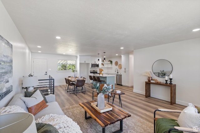 1488 E 580 S, Provo, UT 84606 - living area with light wood-style floors and recessed lighting