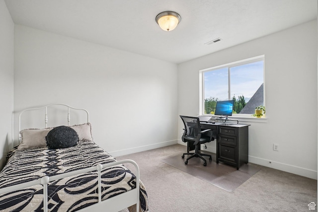 2577 W Garden Creek Way Unit 106, West Jordan, UT 84088 - bedroom with light carpet and a desk