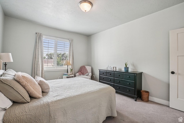 2577 W Garden Creek Way Unit 106, West Jordan, UT 84088 - bedroom featuring carpet flooring and baseboards