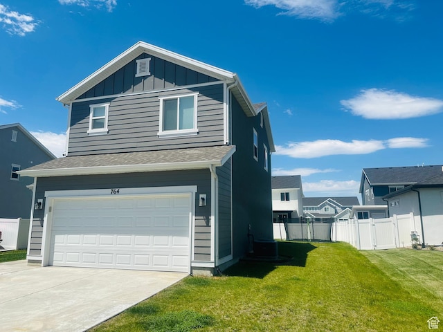 764 S 290 W, American Fork, UT 84003 - view of front of home with a garage, board and batten siding, and driveway