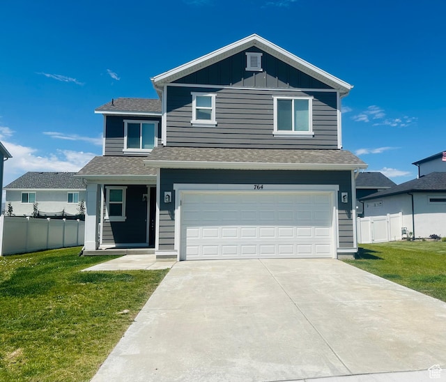 764 S 290 W, American Fork, UT 84003 - traditional-style home featuring board and batten siding, concrete driveway, a garage, and a shingled roof