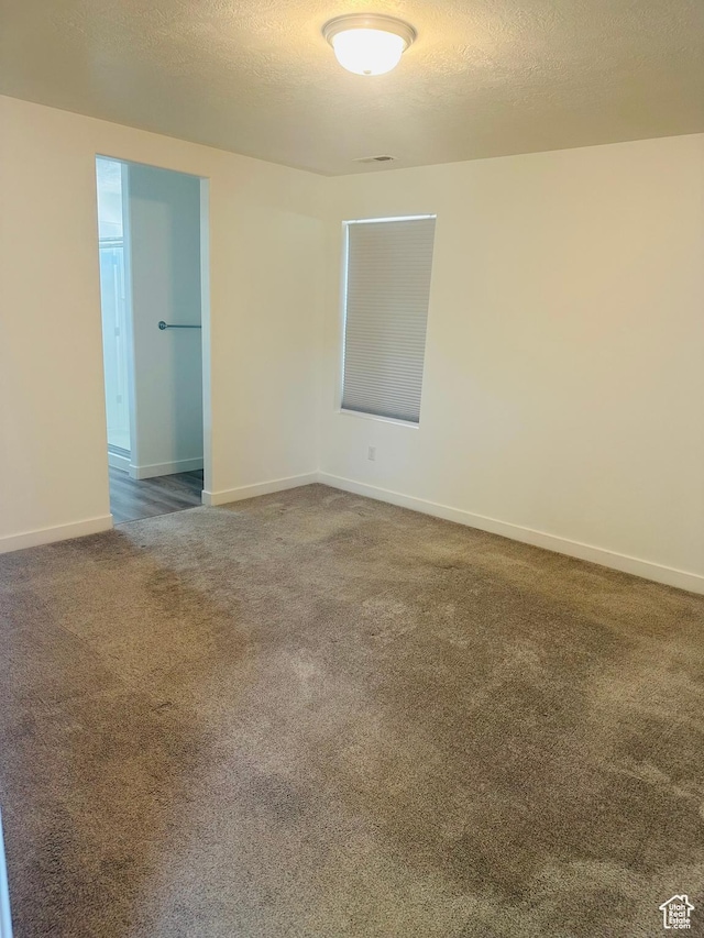 764 S 290 W, American Fork, UT 84003 - empty room featuring carpet flooring and a textured ceiling