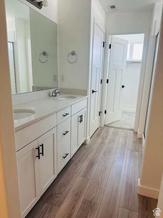 764 S 290 W, American Fork, UT 84003 - bathroom with double vanity and wood finished floors