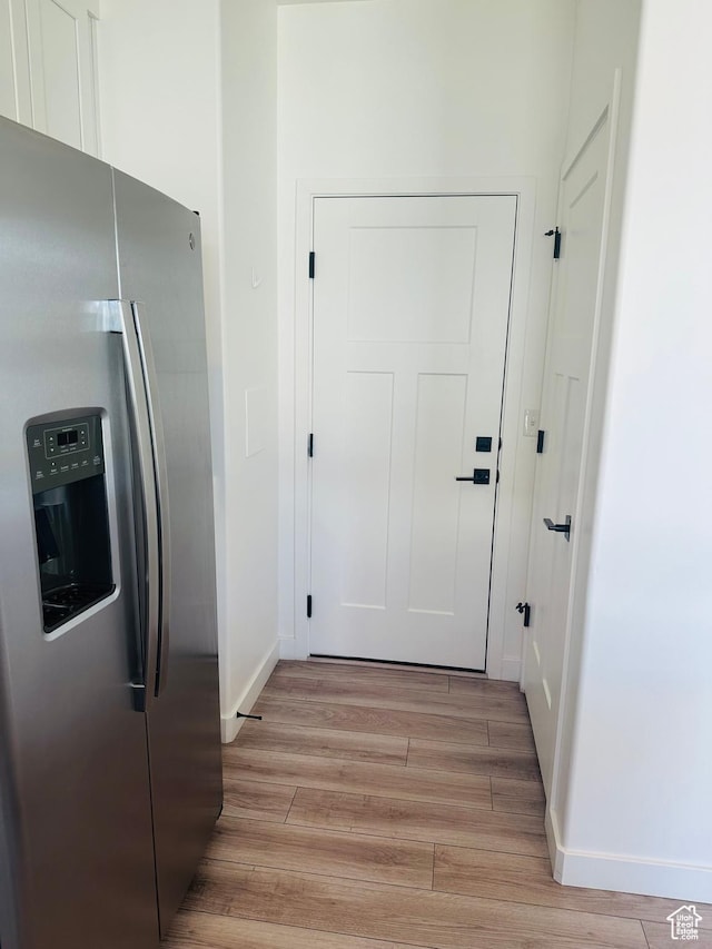 764 S 290 W, American Fork, UT 84003 - doorway with light wood-type flooring and baseboards