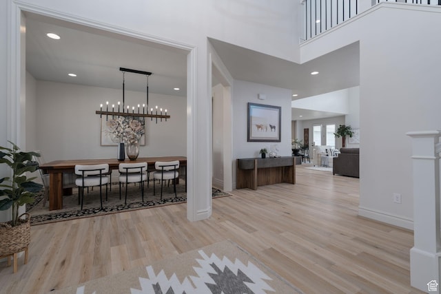 1914 E 540 S, Heber City, UT 84032 - entrance foyer featuring wood finished floors, a chandelier, a towering ceiling, and recessed lighting