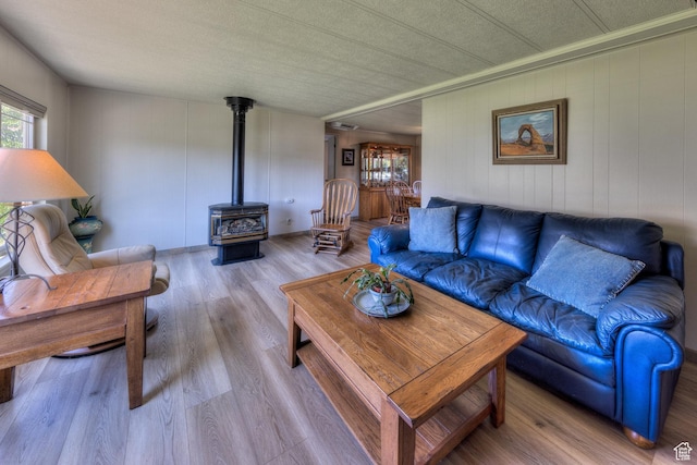 1281 Holyoak Ln E, Moab, UT 84532 - living room with a wood stove and wood finished floors