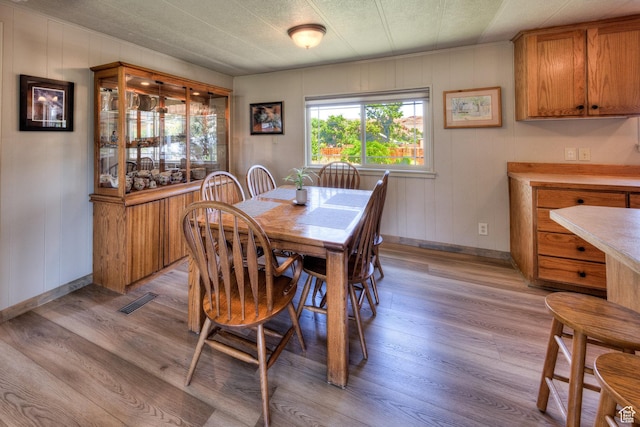 1281 Holyoak Ln E, Moab, UT 84532 - dining room featuring light wood-type flooring and baseboards